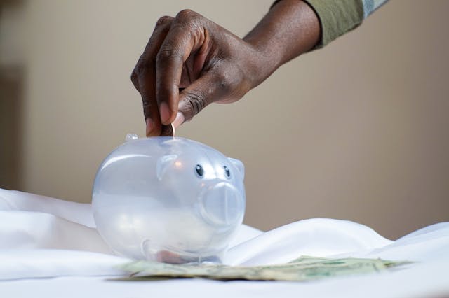 saving money in piggy bank